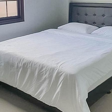 Mahkota Residence Mitra Reddoorz การาวัง ภายนอก รูปภาพ